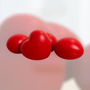 Červený antistresový míček MDT ve tvaru srdce